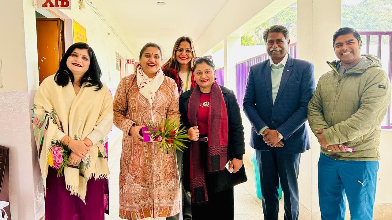 HumanOS team with school educators